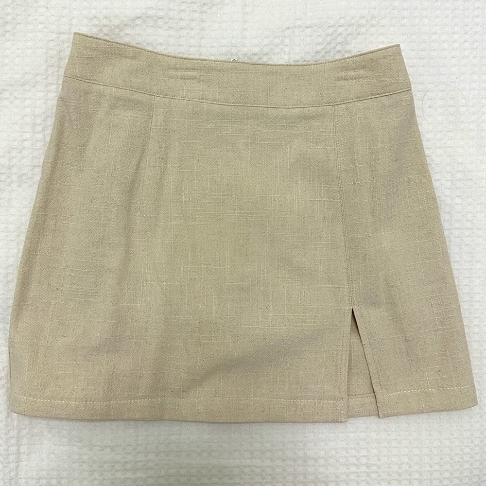 Lioness beige mini skirt size 4